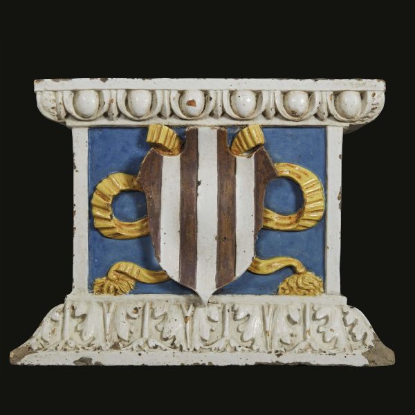 Workshop of Andrea della Robbia, circa 1510, A relief with coat of arms, polychrome glazed terracotta, 28,5x38x10 cm