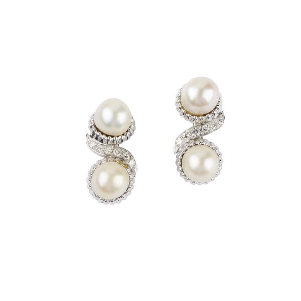 



PEARL AND DIAMOND CLIP EARRINGS IN 18KT WHITE GOLD