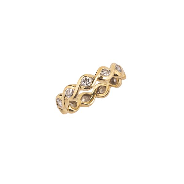 DIAMOND ETERNITY RING IN 18KT YELLOW GOLD