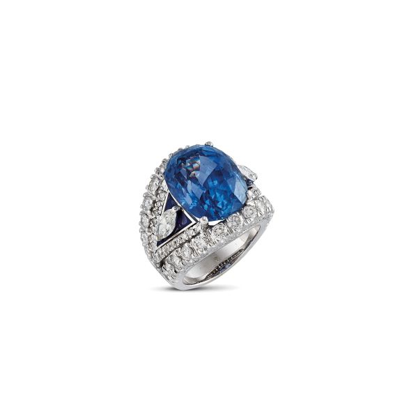 



CEYLON SAPPHIRE AND DIAMOND BAND RING IN 18KT WHITE GOLD