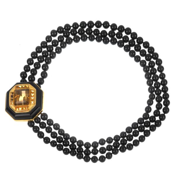



MULTI-STRAND NECKLACE IN 18KT YELLOW GOLD AND ONYX