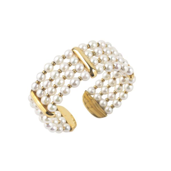 BRACCIALE A FASCIA CON PERLE