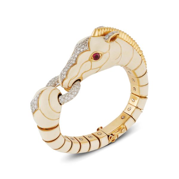 



TRESOR ANIMALIER BANGLE BRACELET IN 18KT YELLOW GOLD