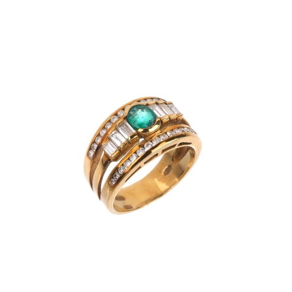 



EMERALD AND DIAMOND BAND RING IN 18KT YELLOW GOLD