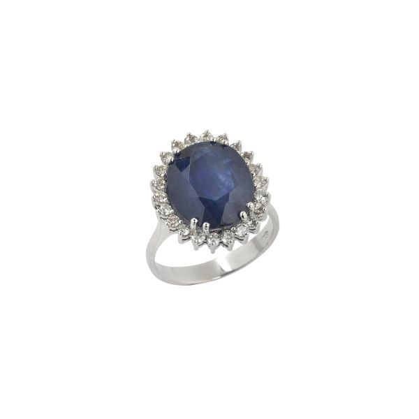 



GLASS-FILLED CORUNDUM RING IN 18KT WHITE GOLD