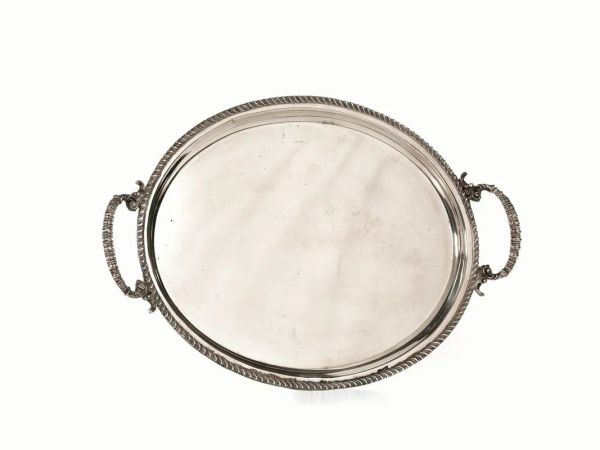  Guantiera,  di forma ovale, in argento, bordo a cordonetto, cm 47,5x31,5, g 1260