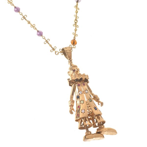 LONG NECKLACE WITH A &quot;CLOWN&quot; PENDANT IN 9KT AND 18KT GOLD