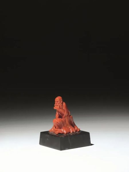 Lohan, Cina sec. XX, in corallo rosso, alt, cm 6