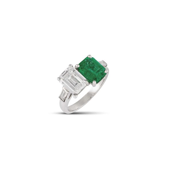CONTRARIE EMERALD AND DIAMOND RING IN PLATINUM