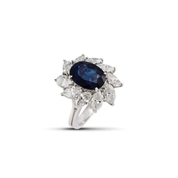 



SAPPHIRE AND DIAMOND FLOWER RING IN 18KT WHITE GOLD
