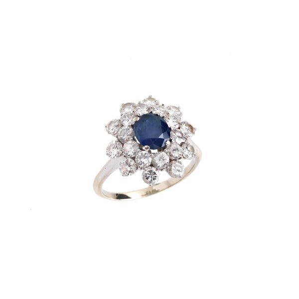 SAPPHIRE AND DIAMOND FLOWER RING IN 18KT WHITE GOLD