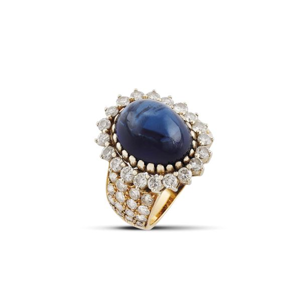 



CEYLON SAPPHIRE AND DIAMOND FLORAL RING IN 18KT YELLOW GOLD