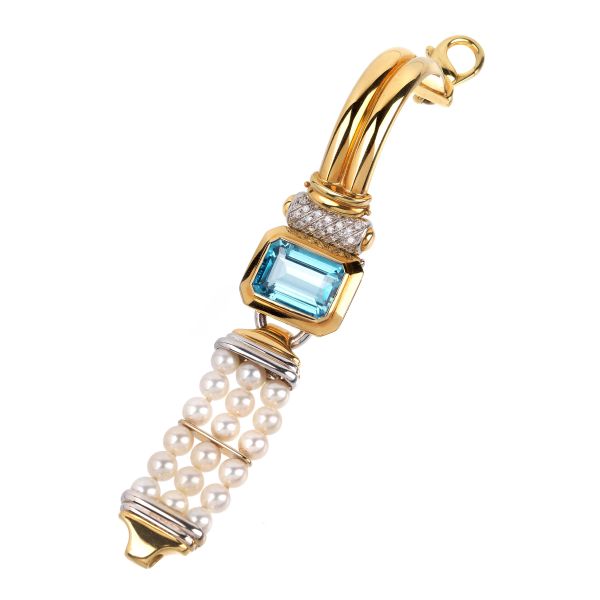 



PEARL DIAMOND AND SEMIPRECIOUS STONE BRACELET IN 18KT YELLOW GOLD 