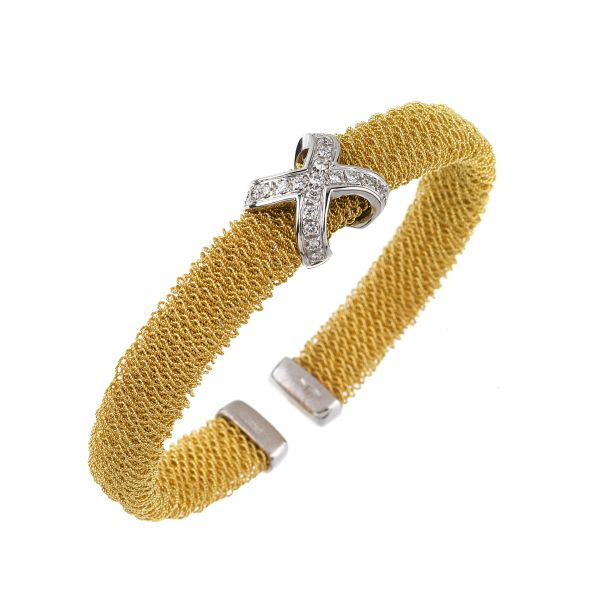 



BRACCIALE RIGIDO CON DIAMANTI