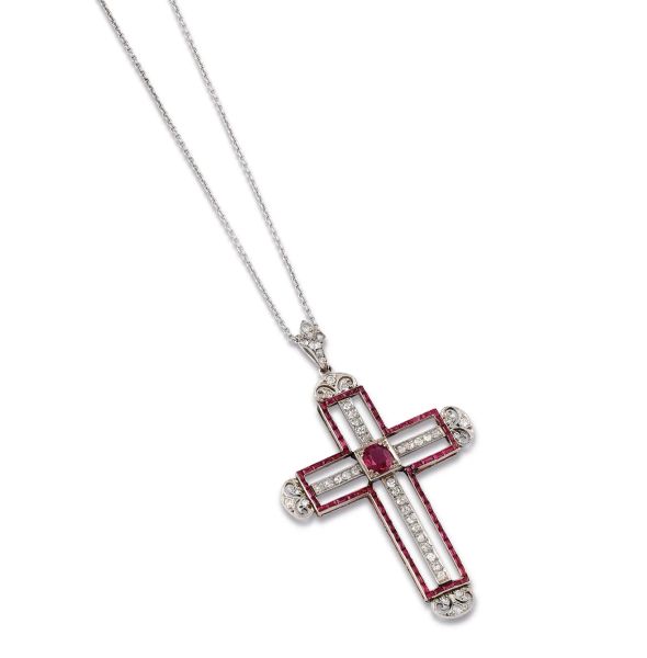 



18KT WHITE GOLD NECKLACE WITH A CROSS-SHAPED RUBY AND DIAMOND PENDANT