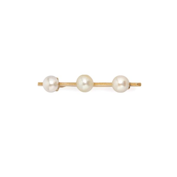 BARRET BROOCH WITH PEARL IN 18KT YELLOW GOLD
