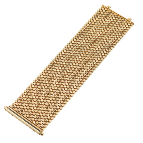 WIDE BAND BRACELET IN 18KT YELLOW GOLD