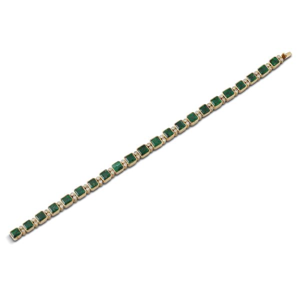 EMERALD AND DIAMOND TENNIS BRACELET IN 18KT YELLOW GOLD