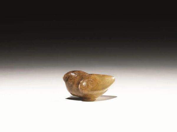 Piccolo intaglio&nbsp; Cina sec. XX, in agata modellato nella forma di piccolo