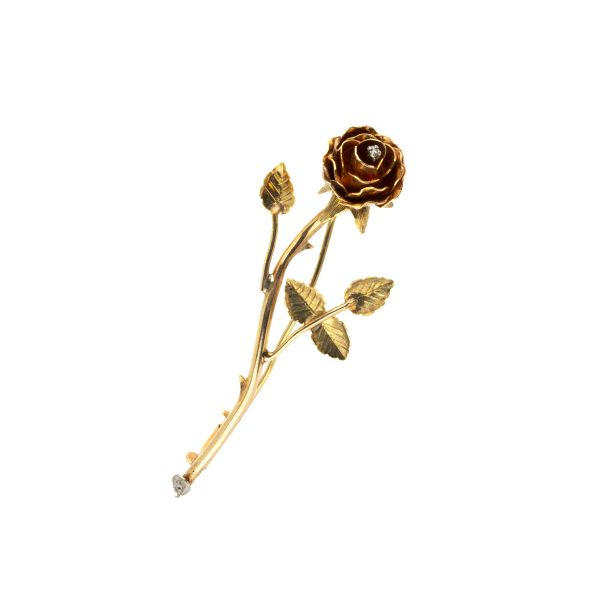 



ROSE-SHAPED BROOCH IN 18KT YELLOW GOLD