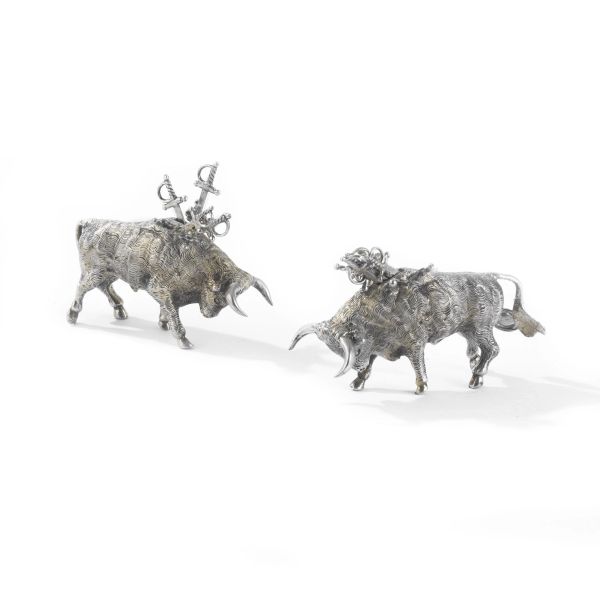 TWO SMALL SILVER PLATED METAL BULLS, 20TH CENTURY