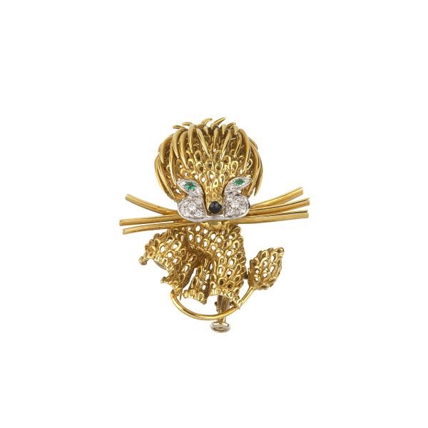 



LION SHAPED BROOCH IN 18KT TWO TONE GOLD