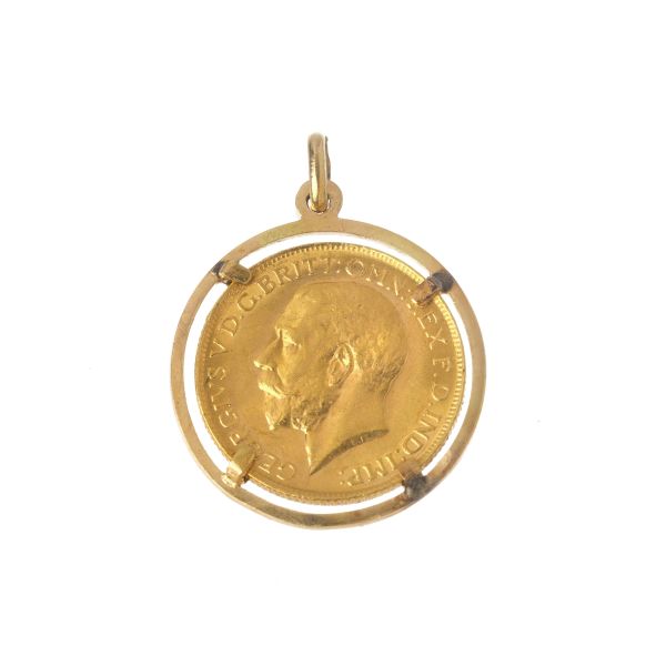 



PENDANT IN 18KT YELLOW GOLD WITH A COIN