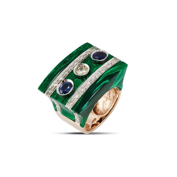 



ANELLO GEOMETRICO CON ZAFFIRI E DIAMANTI 