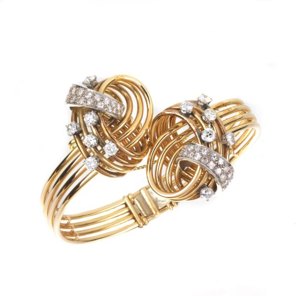 CONTRARIE DIAMOND BANGLE IN 18KT ROSE AND YELLOW GOLD