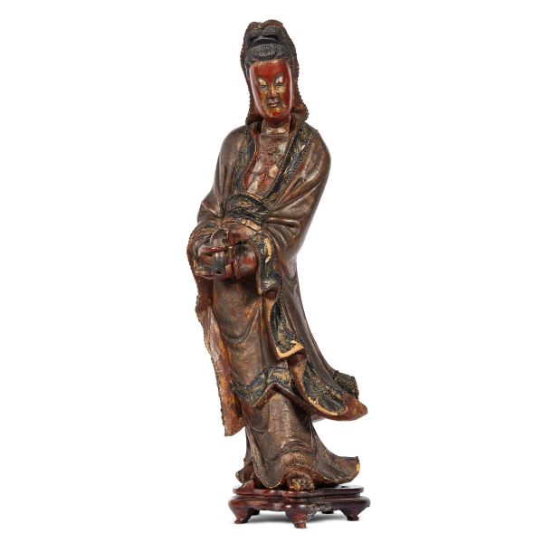 



A CHINESE FIGURE OF GUANYIN, 19TH CENTURY