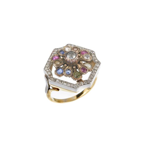 



ANELLO CON PIETRE SINTETICHE E DIAMANTI
