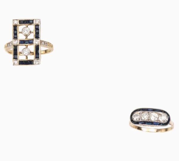Due anelli in oro giallo, zaffiri e diamanti