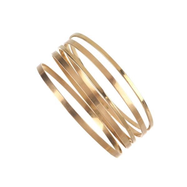 FIVE BANGLES IN 18KT YELLOW GOLD