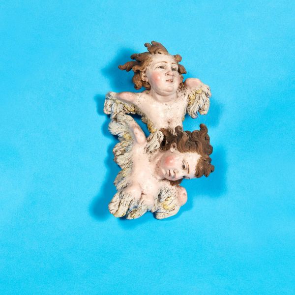 



A PAIR OF CHERUB, NAPLES, 18TH/19TH CENTURY