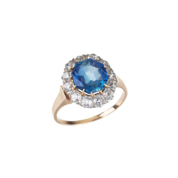 CEYLON SAPPHIRE AND DIAMOND RING IN 18KT ROSE GOLD AND PLATINUM