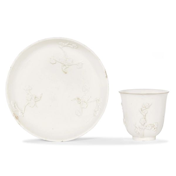 A CAPODIMONTE CUP WITH SAUCER, NAPLES, 1745-1750