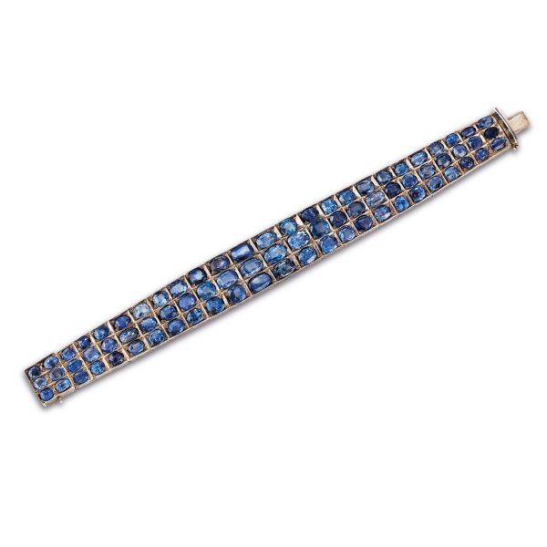 



SAPPHIRE BAND BRACELET IN 9KT GOLD AND SILVER 