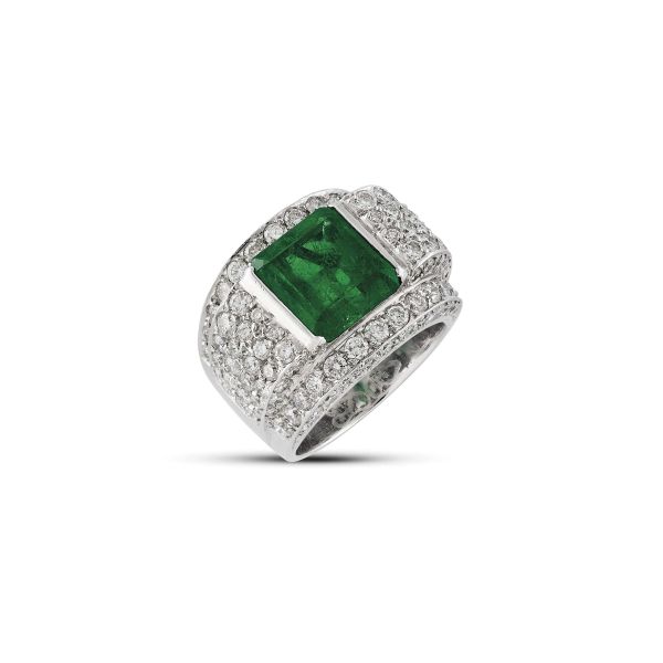 



COLOMBIAN EMERALD AND DIAMOND BAND RING IN 18KT WHITE GOLD