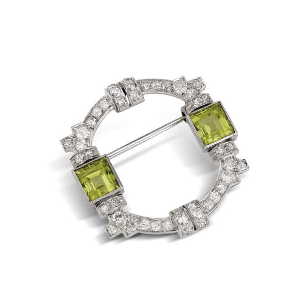 PERIDOT AND DIAMOND BROOCH IN PLATINUM