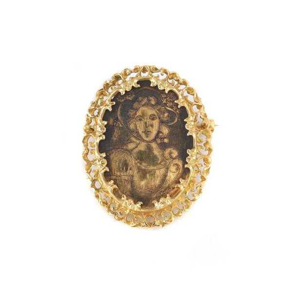 BROOCH IN 18KT YELLOW GOLD REPRESENTING A LADY WITH HER HAT ON