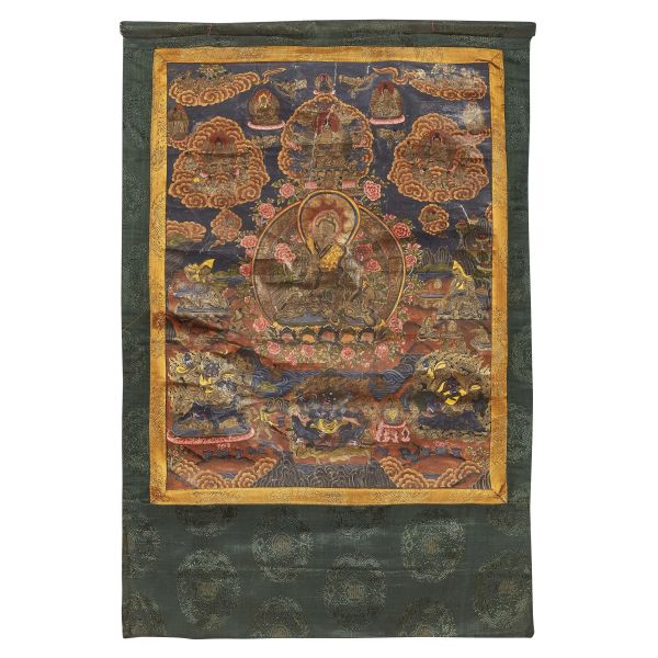 A TANGKA ON PAPER APPLIED TO FABRIC, DEPICTING PADMASAMBHAVA WITH A BLACK BLUE BACKGROUND. TIBET, 19TH CENTURY