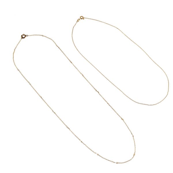 



TWO CHAIN NECKLACES IN 18KT YELLOW GOLD