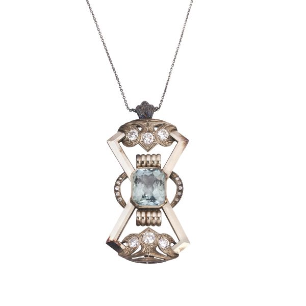 



SYNTHETIC STONE AND DIAMOND NECKLACE IN GOLD AND METAL