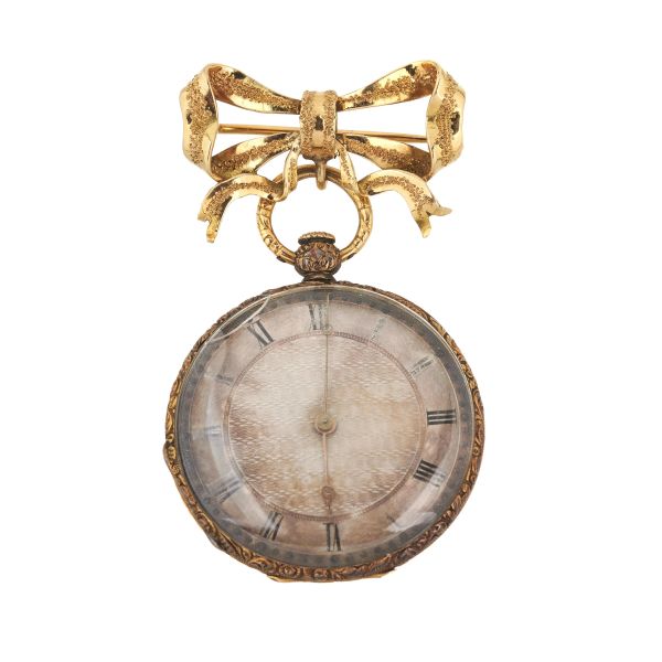 



POCKET WATCH WITH BOW SHAPED BROOCH 