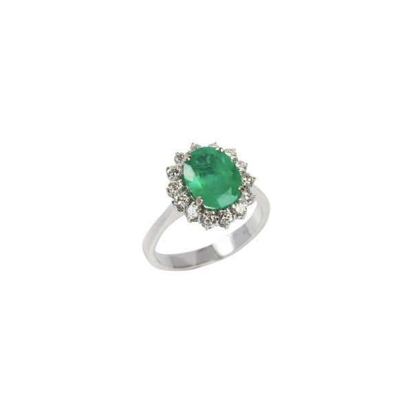 



ANELLO A MARGHERITA CON SMERALDO E DIAMANTI