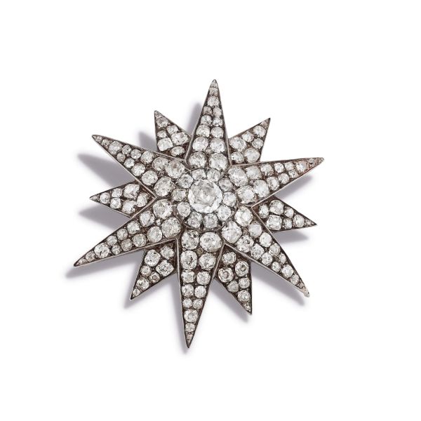 



STAR-SHAPED DIAMOND BROOCH IN SILVER AND 9KT YELLOW GOLD