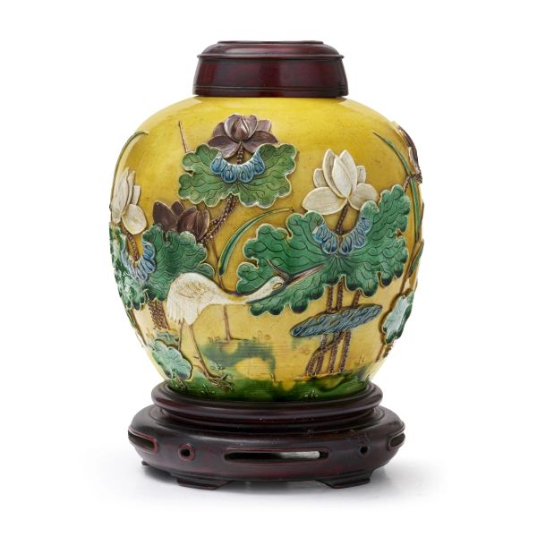 



A YELLOW-GLAZED RELIEF-DECORATED JAR, CHINA, REPUBLIC PERIOD (1912&ndash;1949) 