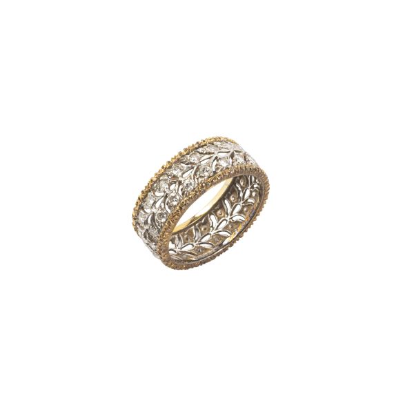 



BUCCELLATI ANELLO A FASCIA CON DIAMANTI