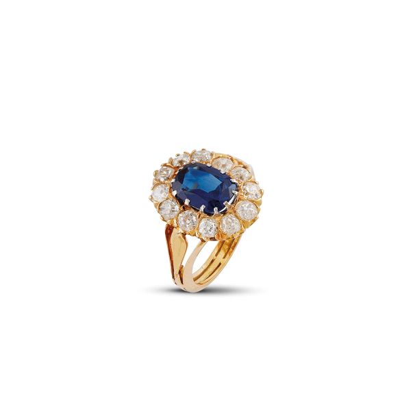 



SAPPHIRE AND DIAMOND FLOWER RING IN 18KT YELLOW GOLD