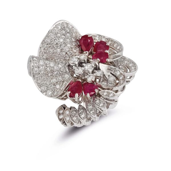 



ANELLO A FASCIA CON DIAMANTI E RUBINI